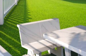 a white table and chair on artificial grass, Orange County, CA