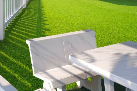 a white table and chair on artificial grass, Orange County, CA