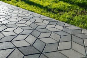 The footpath in the park is paved with diamond-shaped concrete tiles, Orange County, CA